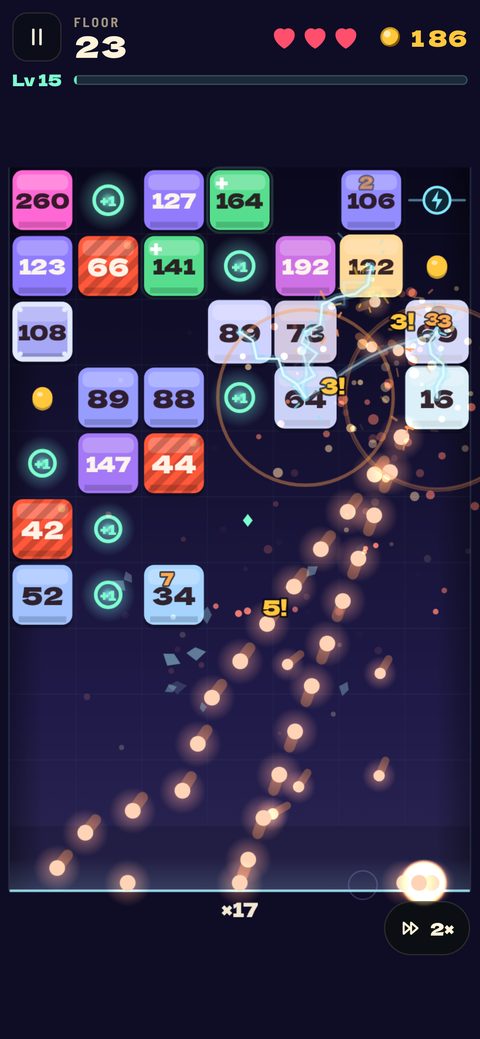 A volley of balls ricocheting through numbered bricks on floor 23